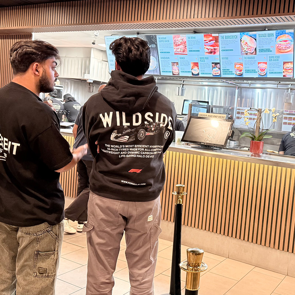 Guests ordering at the counter inside Burns Road, Tustin